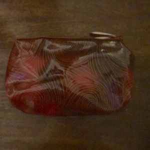 Wine red plastic outer makeup travel bag